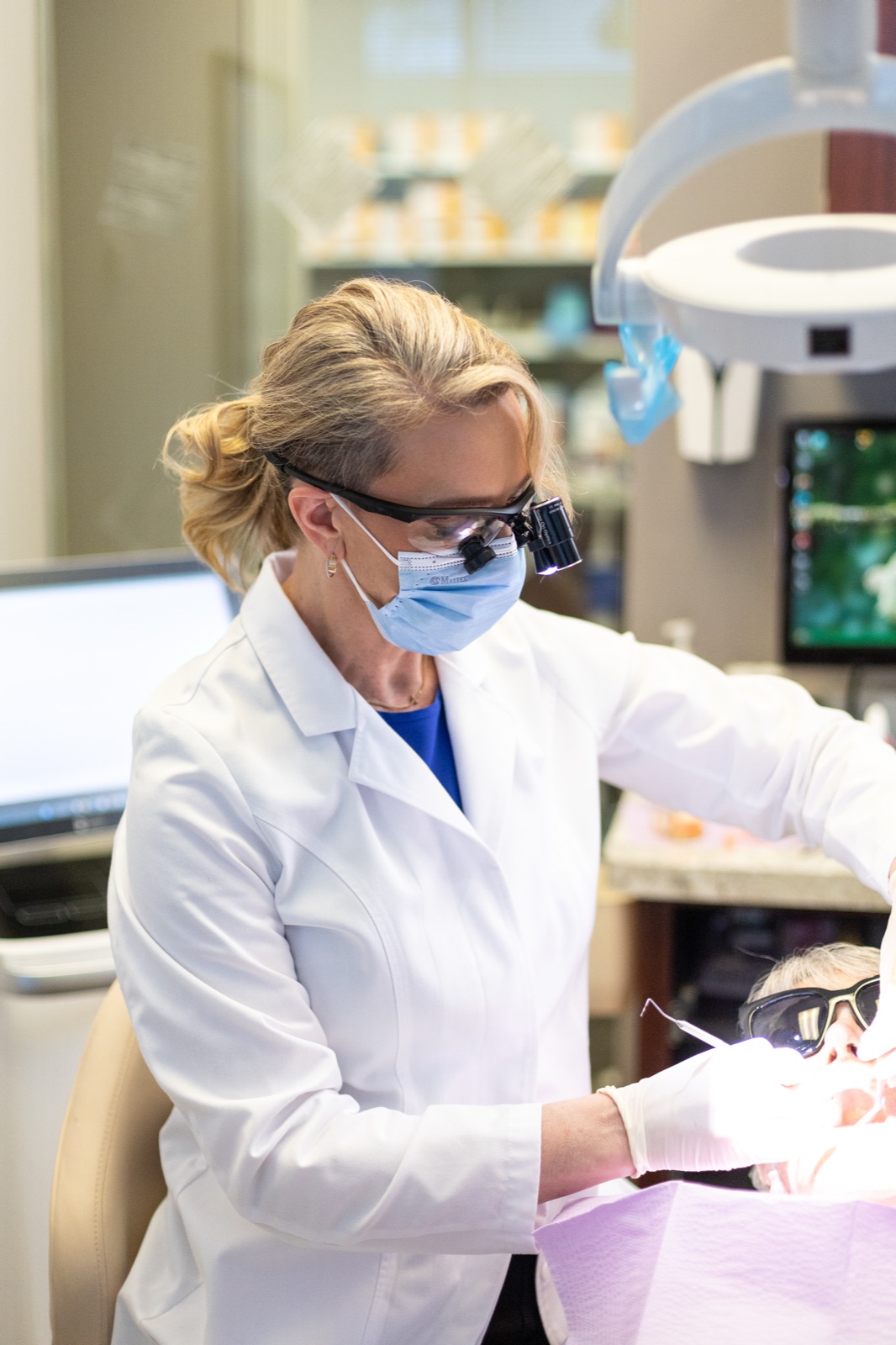 Dr. House performing a clinical evaluation at the chair